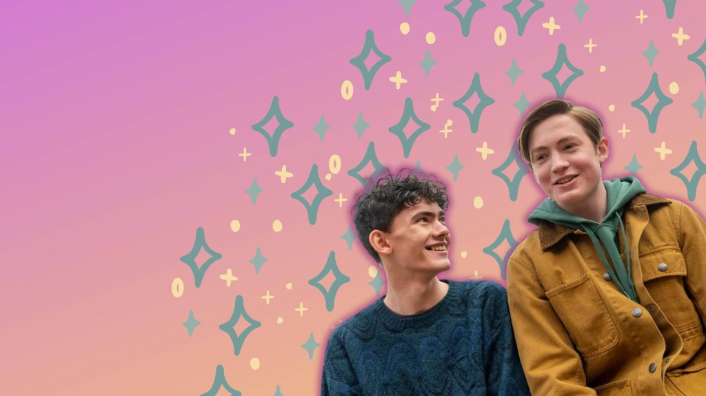 Nick Nelson and Charlie Spring Heartstopper wallpaper with Kit Connor Joe Locke pink sparkles background