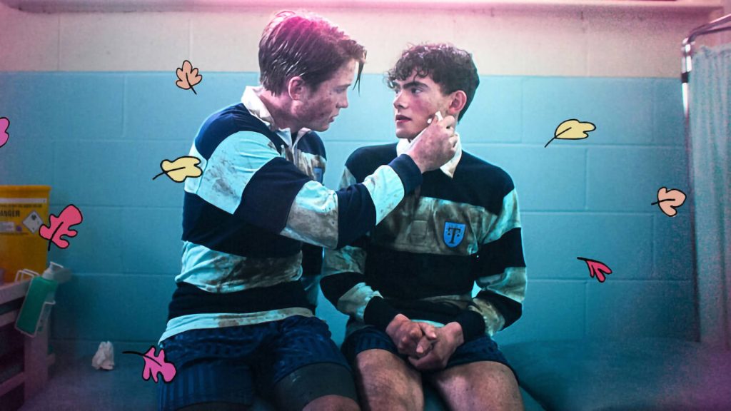 Heartstopper wallpaper Nick Nelson tenderly touches Charlie Spring in cozy animated locker room scene