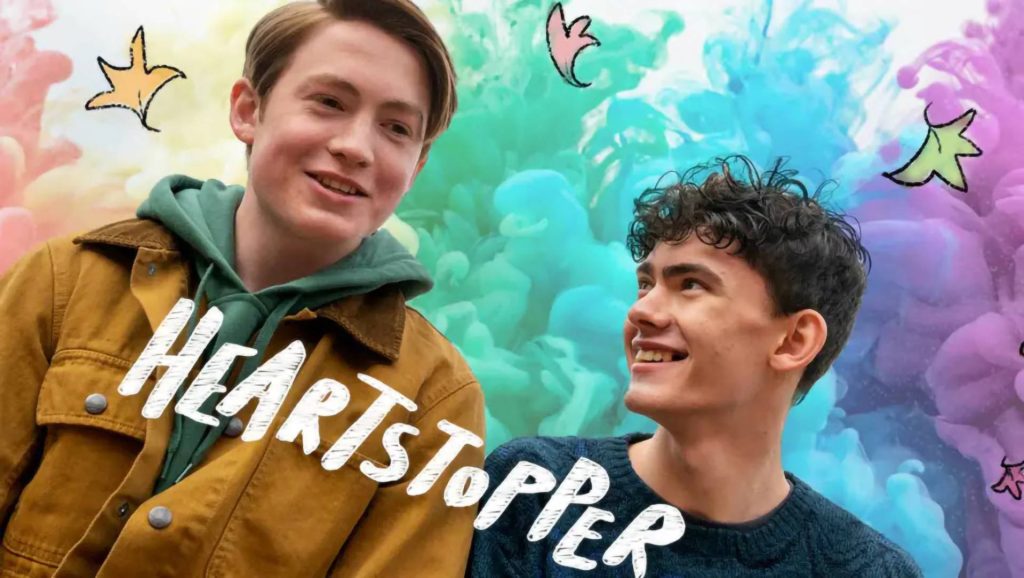 Heartstopper wallpaper with Kit Connor as Nick and Joe Locke as Charlie vibrant rainbow smoke