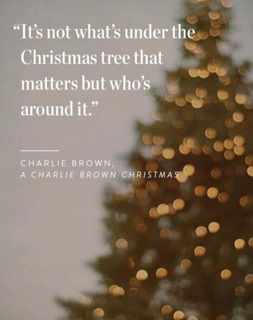 Warm Christmas Tree Wallpaper with Heartwarming Quote on Family