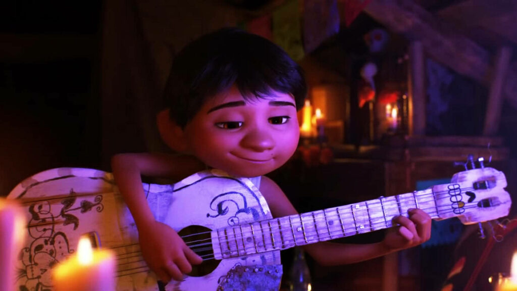 Heartwarming Coco Wallpaper: Miguel's Musical Journey in Candlelight