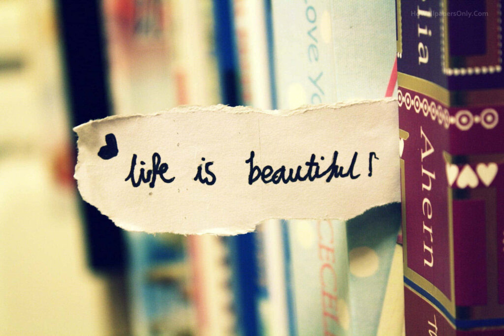 Cozy Bookshelf Wallpaper: Handwritten 'Life is Beautiful' Note