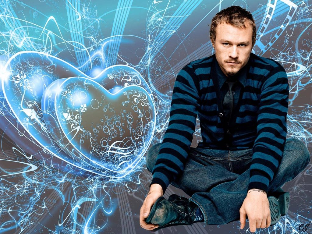 Heath Ledger digital fan art wallpaper with glowing blue trails and abstract hearts background