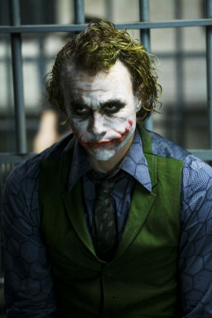 Stunning Joker Wallpaper: Heath Ledger's Iconic Look in Jail Cell
