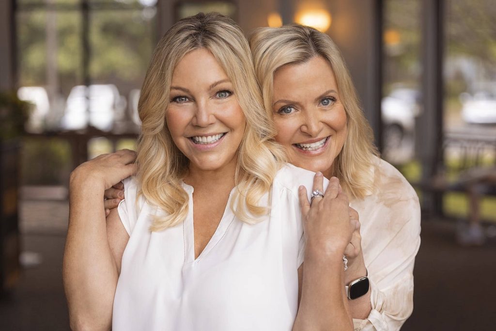 Heather Locklear and Kristine Carlson smiling warmly in bright natural light professional portrait Wallpaper