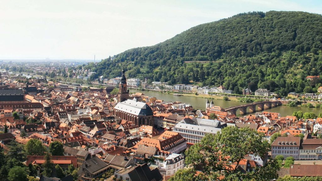 Daylight view of Heidelberg Germany from castle with Heiliggeistkirche Neckar River Old Bridge Wallpaper
