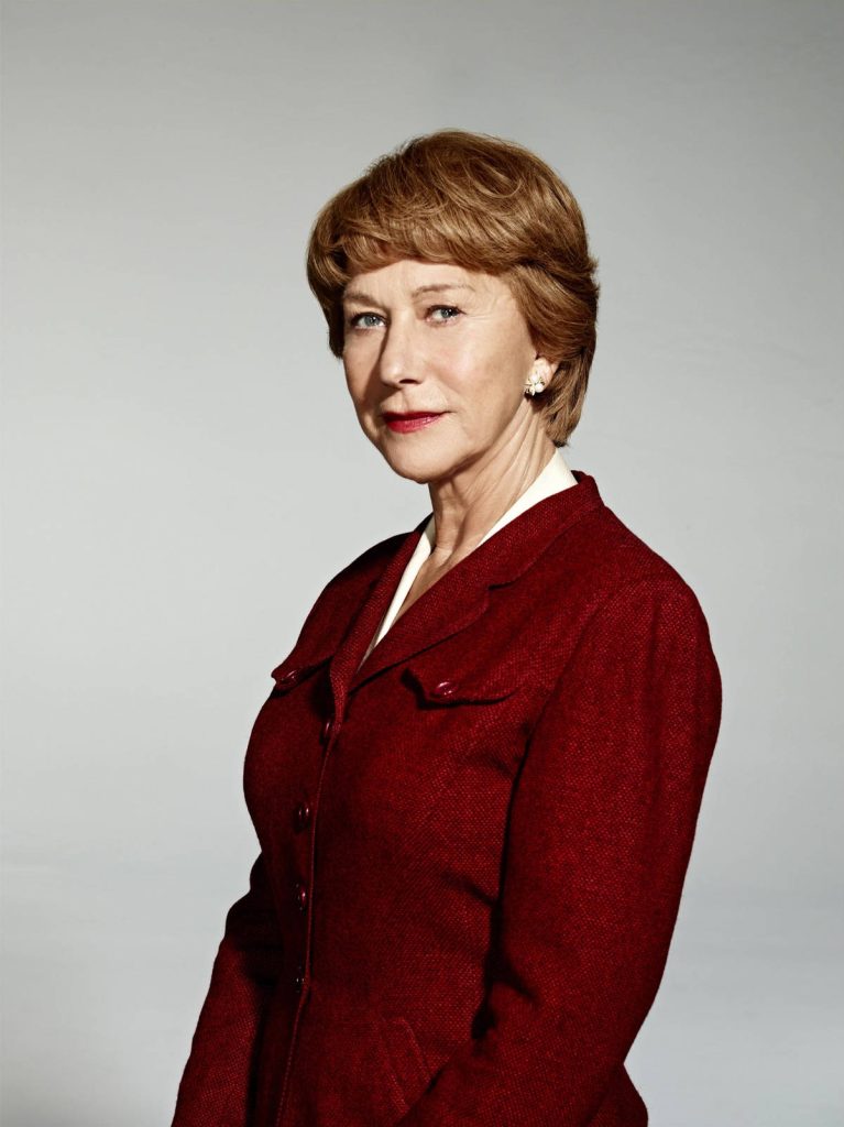Helen Mirren portrait in red jacket neutral gray background professional studio lighting Wallpaper