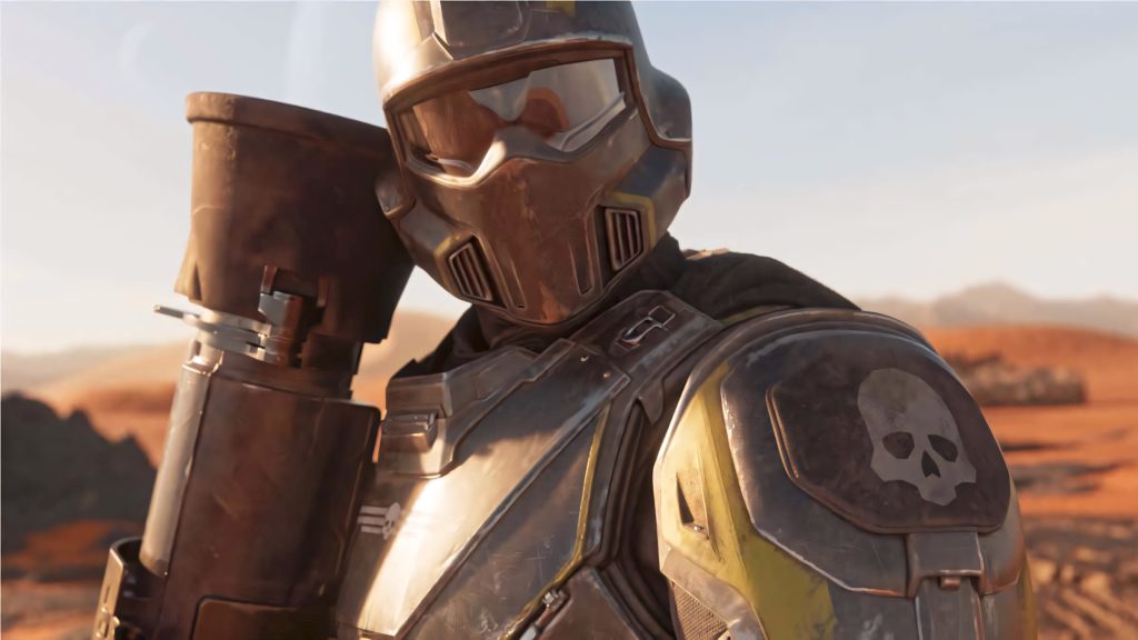 Helldivers 2 soldier in skull armor patrols sunlit desert with heavy rocket launcher CGI wallpaper