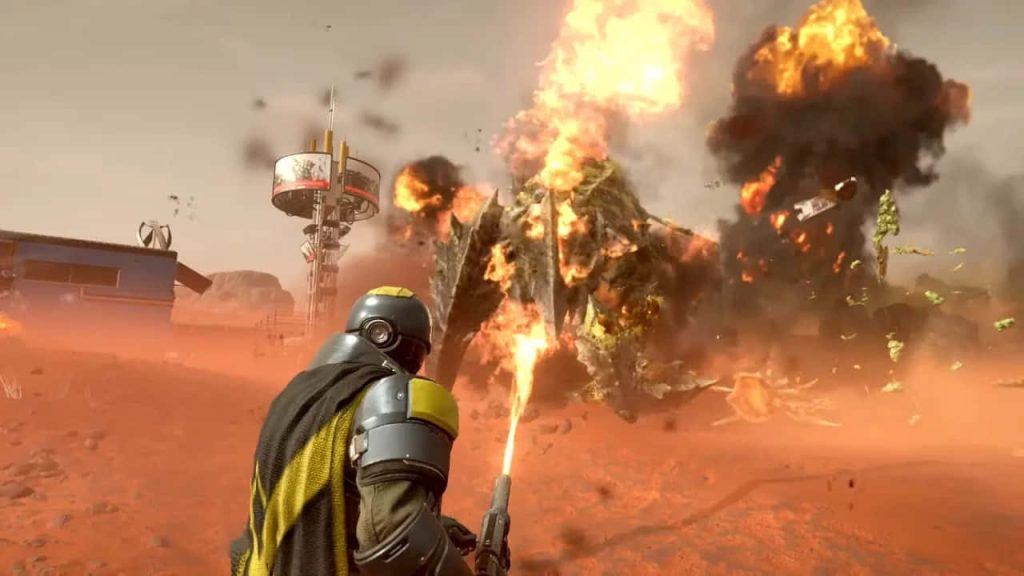 Helldivers 2 soldier using flamethrower against Terminid charger on dusty alien planet wallpaper