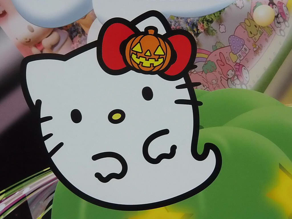 Spooky Hello Kitty Wallpaper: Ghostly Charm & Festive Fun
