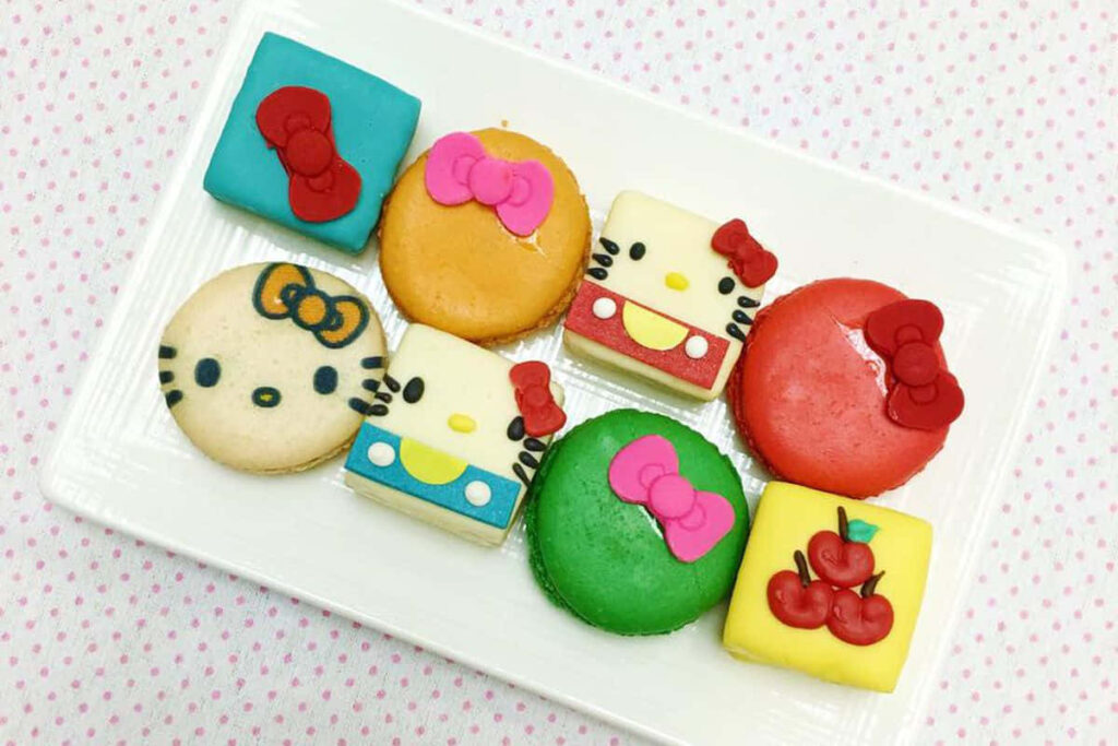 Hello Kitty Cake Wallpaper: Cute Macarons on Pink Polka Dots
