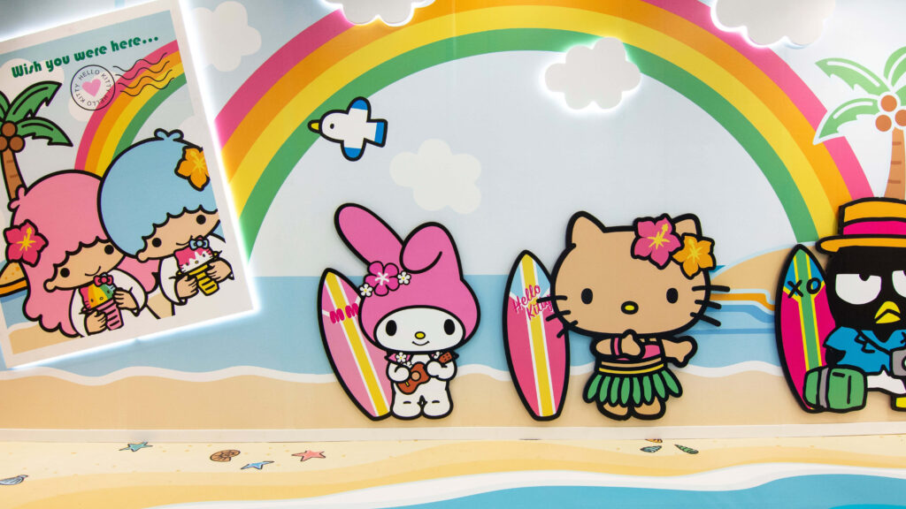 Hello Kitty Beach Scene Wallpaper: Colorful Tropical Fun
