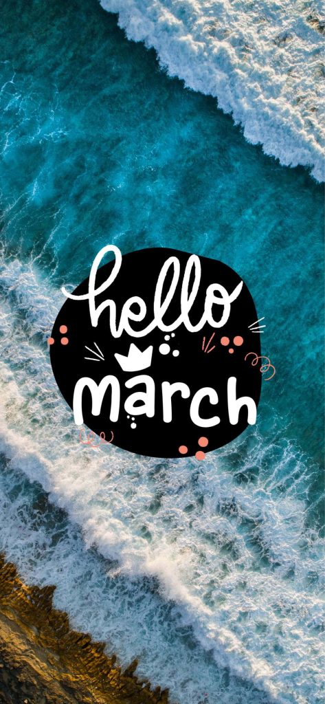 Hello March wallpaper with ocean waves crashing golden cliffs and playful pink accents
