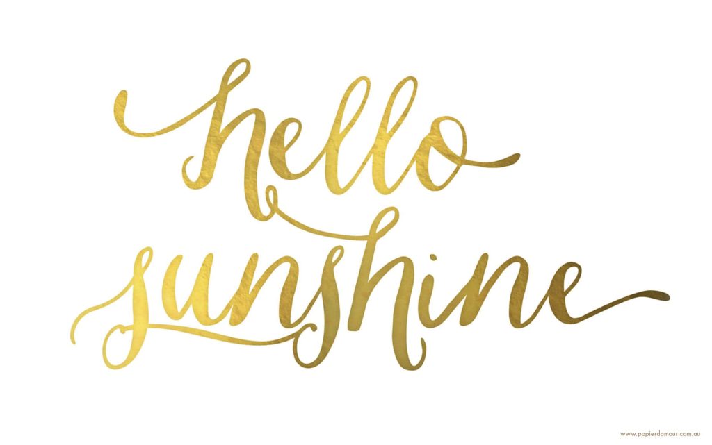 Minimalist hello sunshine wallpaper with gold cursive text on white background for desktop