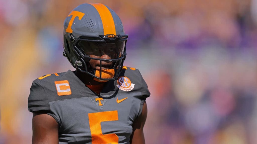 Tennessee Volunteers quarterback Hendon Hooker in grey orange uniform number 5 focused intense pose Wallpaper