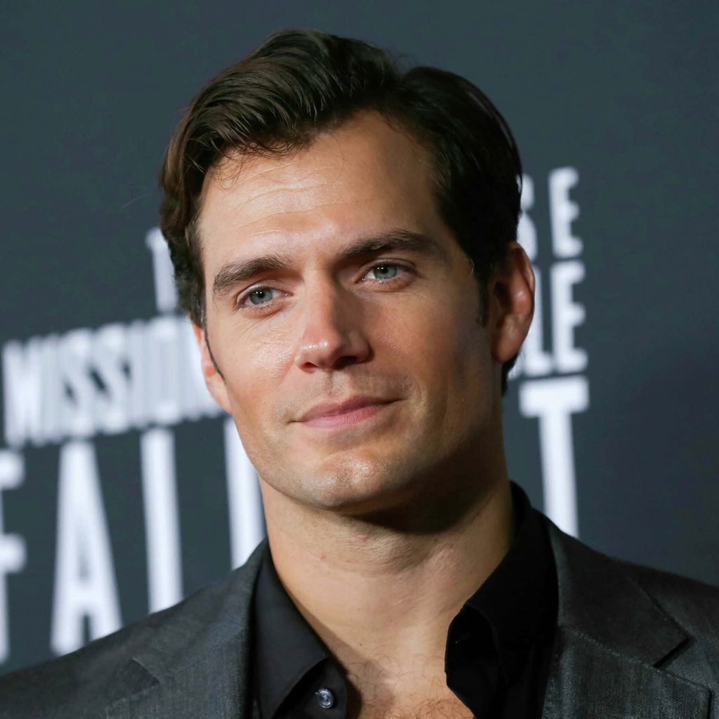 Henry Cavill sharp portrait Mission Impossible Fallout premiere sleek suit dark cinematic background Wallpaper