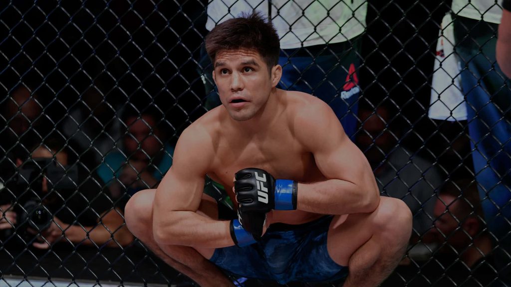 Henry Cejudo crouching in octagon intense UFC 227 MMA fight gear championship wallpaper