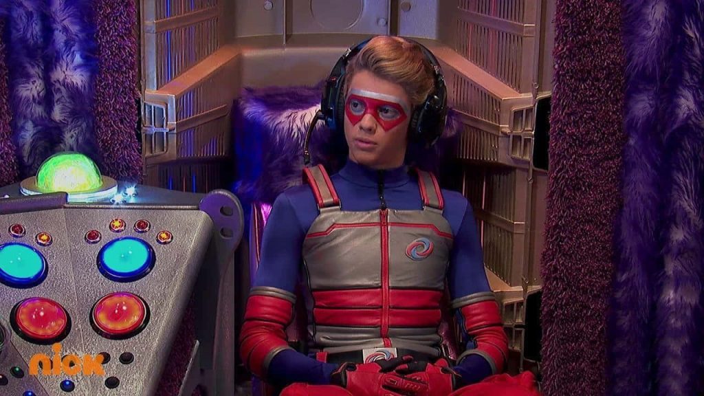 HD Henry Danger wallpaper featuring Jace Norman as Kid Danger in vibrant Man Cave control room
