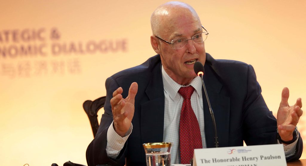 Henry M Paulson former US Treasury Secretary speaking at Strategic Economic Dialogue in suit and red tie Wallpaper