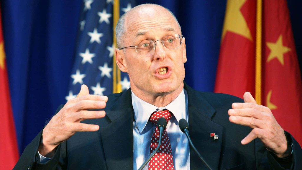 Henry M Paulson speaking at US China summit with US and China flags backdrop high resolution Wallpaper
