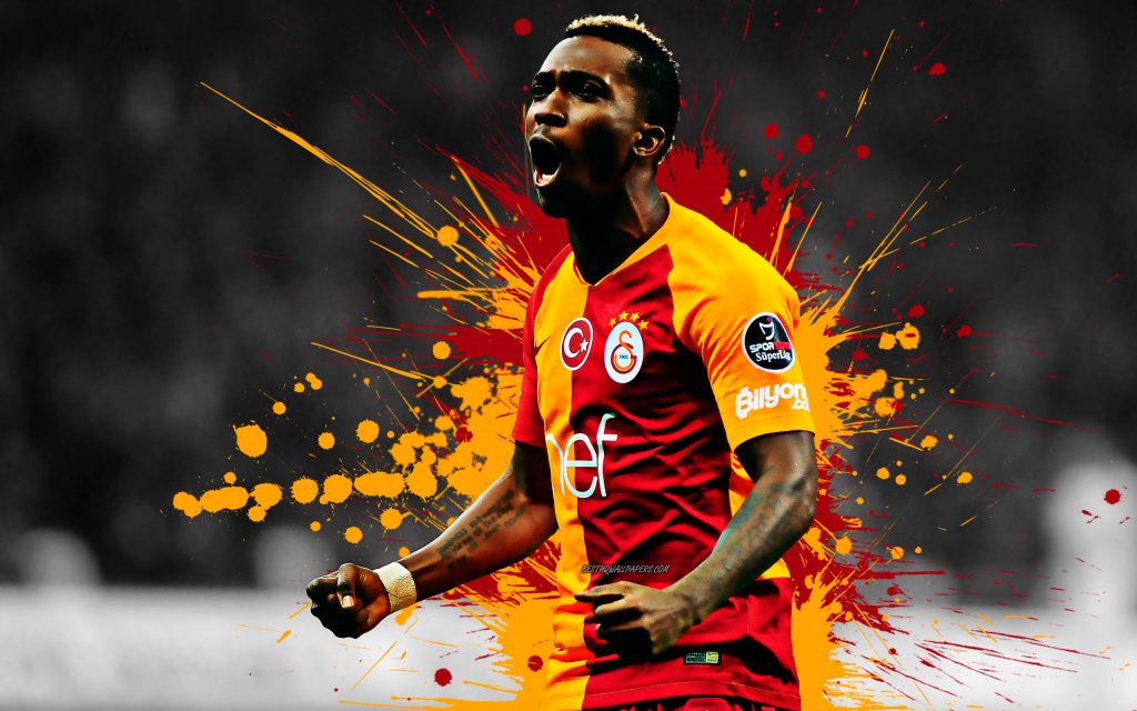 Henry Onyekuru Galatasaray wallpaper vibrant goal celebration red yellow splashes black white background