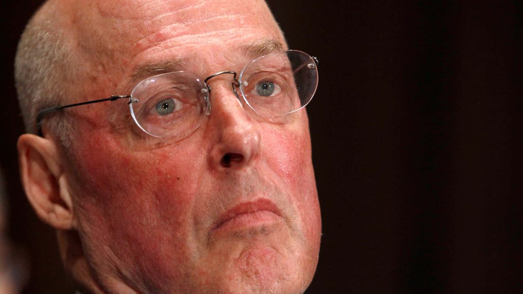 Close-up portrait of Henry Paulson former US Treasury Secretary with serious expression and glasses Wallpaper