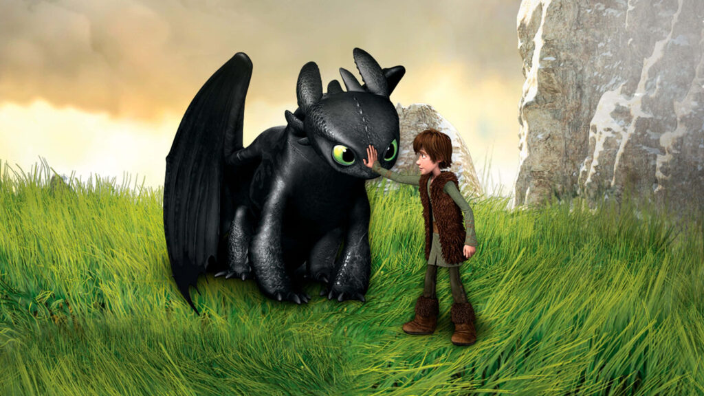 “Heartwarming Hiccup & Toothless Wallpaper Amid Scenic Nature”