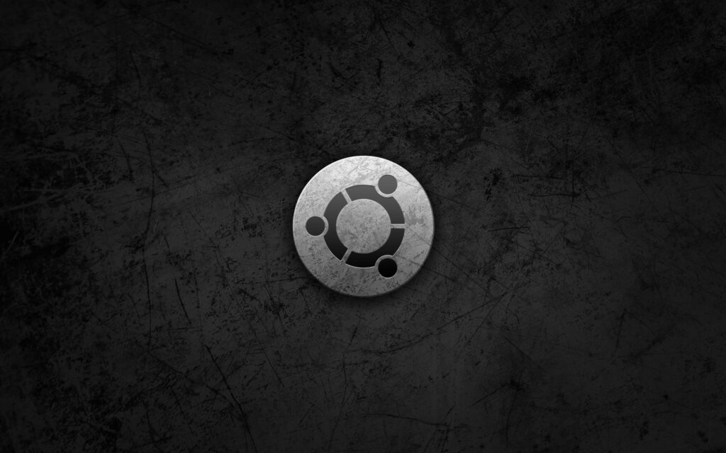Ubuntu Linux in High Definition: A Round Gray Logo in Stunning QHD Wallpaper