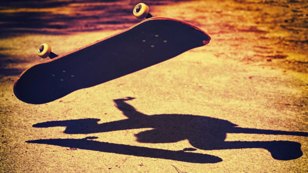 Riding the Concrete Waves: A Cool Street Skateboarding HD Wallpaper Background Photo