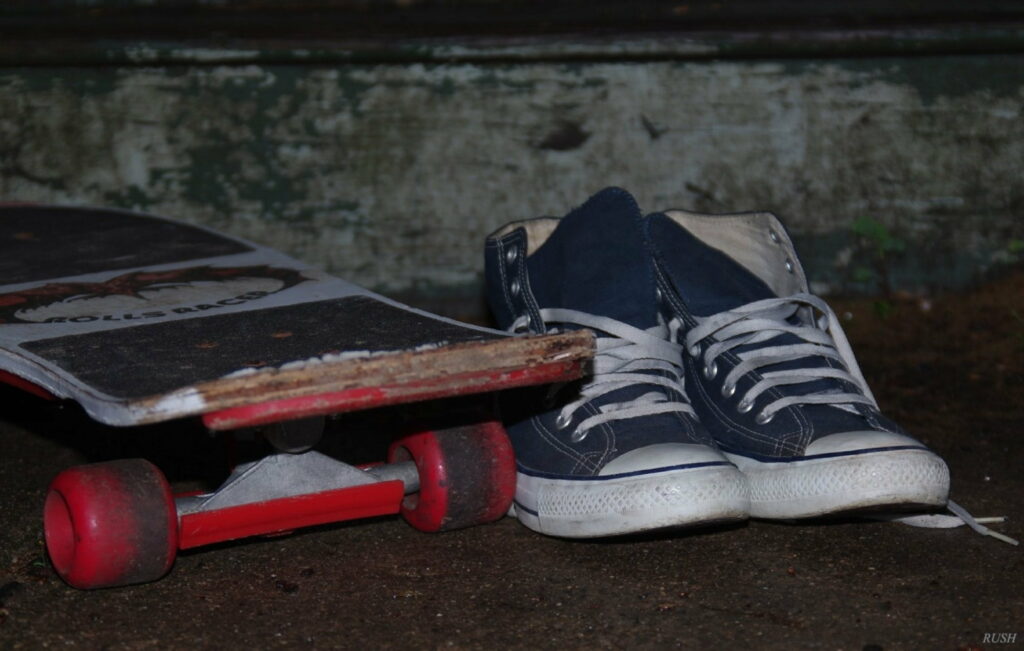 Airborne: Skateboarding Sneakers in HD Wallpaper Background Photo