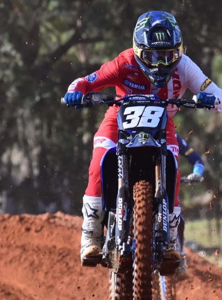 Haiden Deegan racing motocross on red dirt Yamaha bike number 38 Monster Energy gear wallpaper