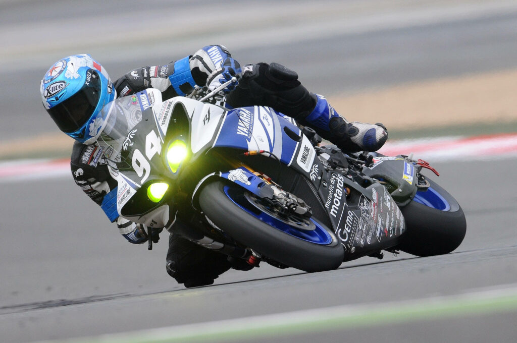 Thrilling Bike Rider Wallpaper: Speed & Precision in Action