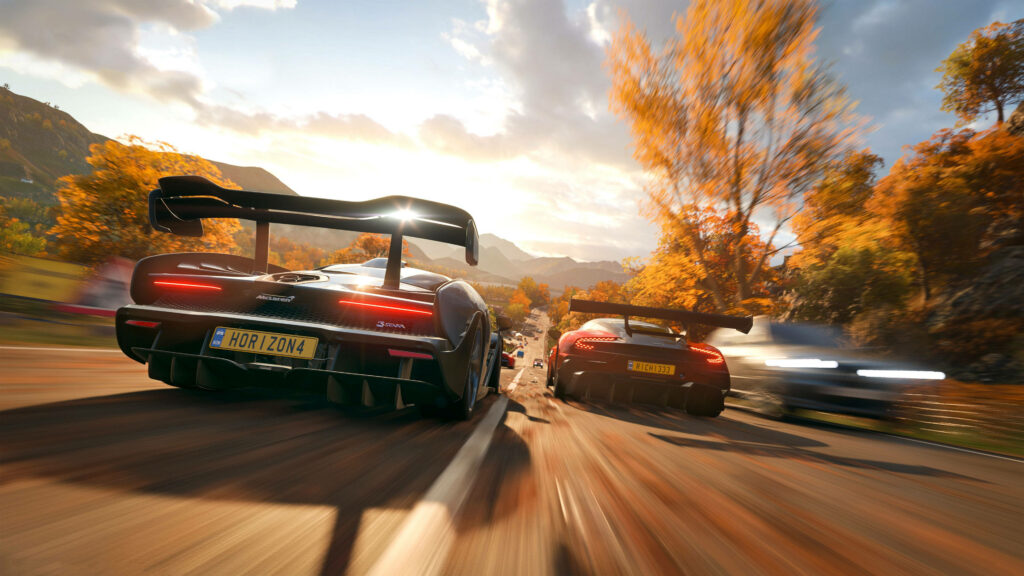 High-performance cars racing on vibrant autumn track Forza gaming wallpaper background