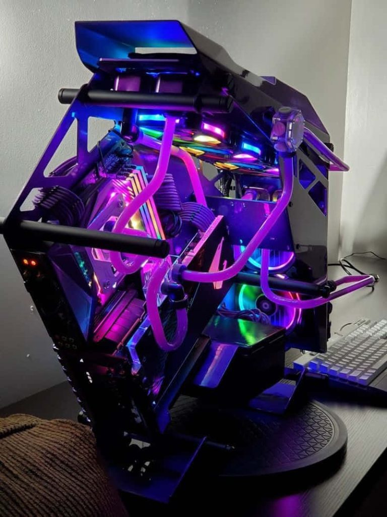 High-performance custom gaming PC wallpaper with RGB lighting and purple liquid cooling loop