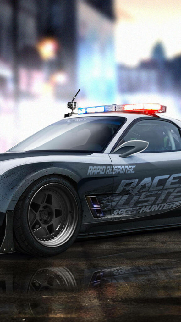 High-performance Need for Speed police car with bold decals and flashing lights ready for action Wallpaper