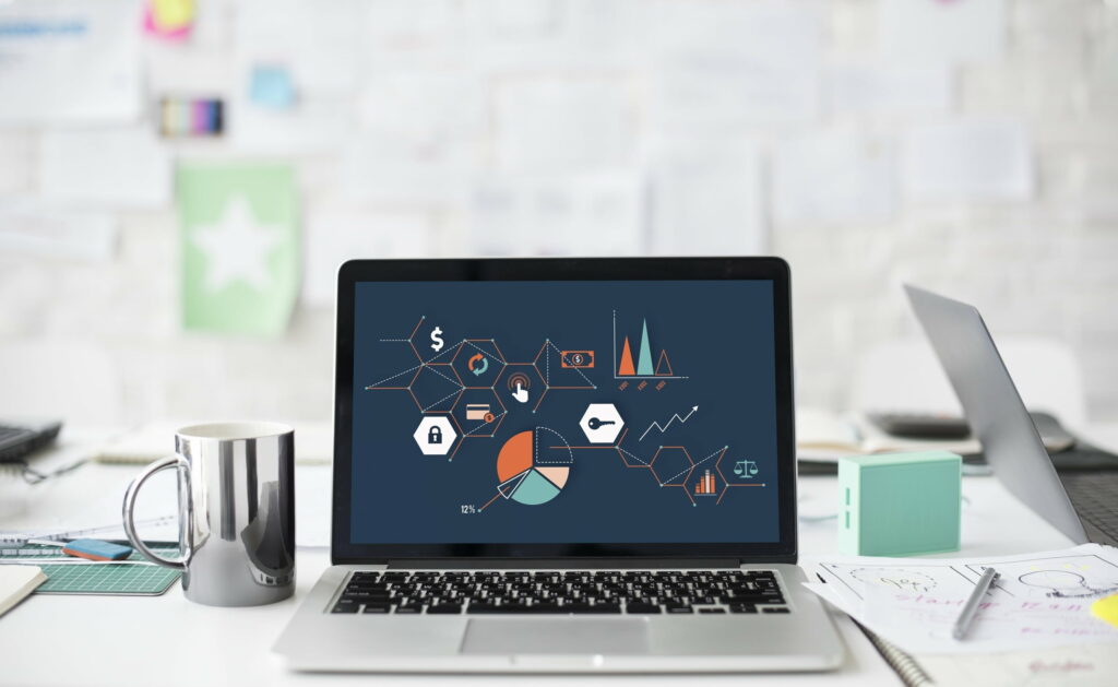 Tech-Savvy Business Professionals in a Modern Workspace Wallpaper