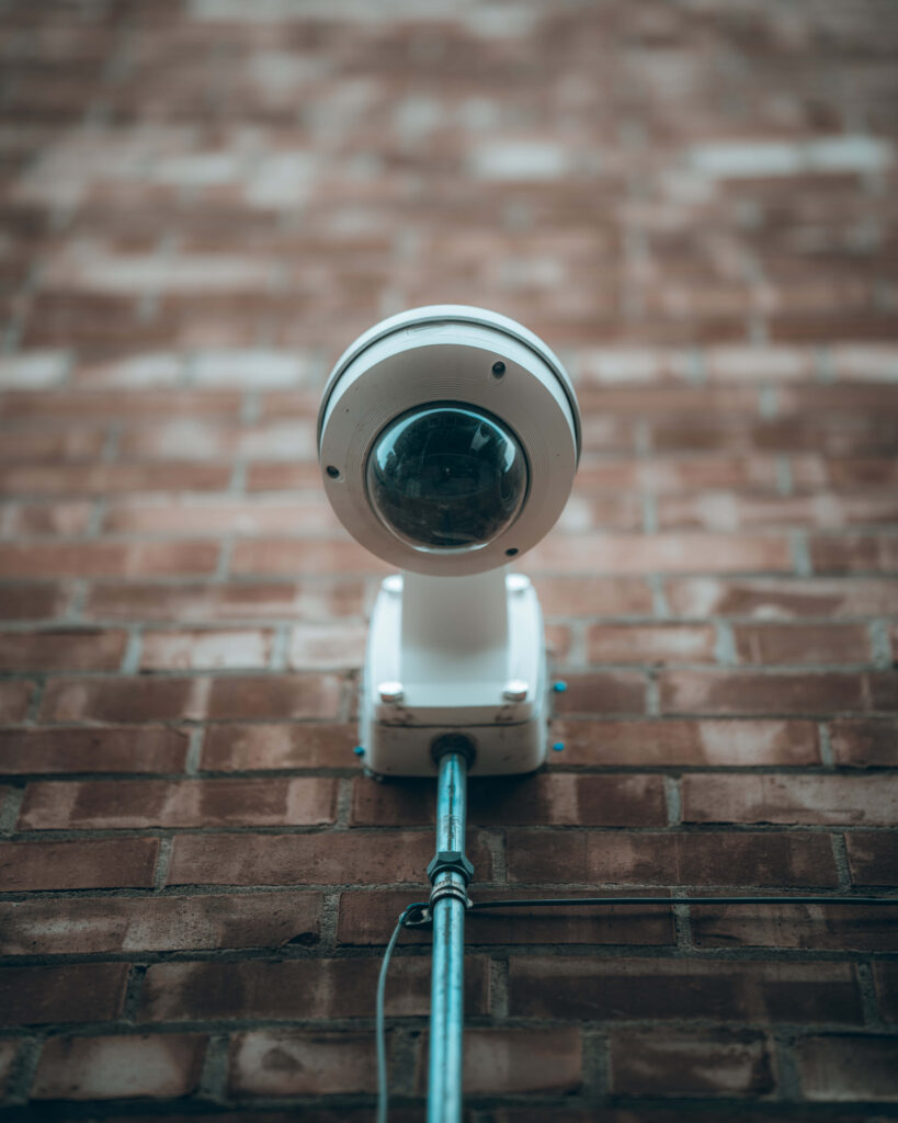 High-Quality 360 Dome Security Camera Wallpaper on Brick Wall