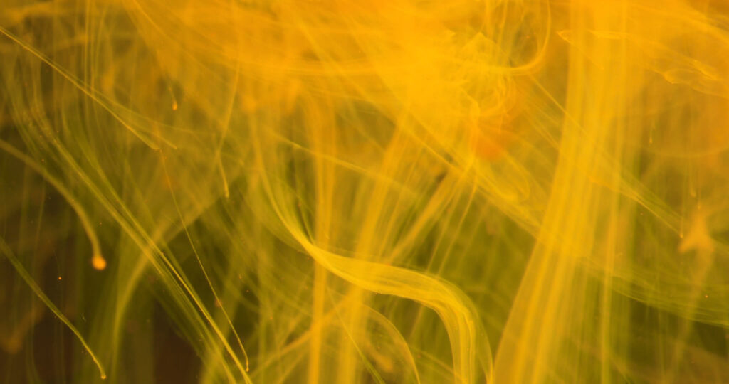 Abstract Yellow Ink Wallpaper - Fluid Design in High Resolution 4096x2160