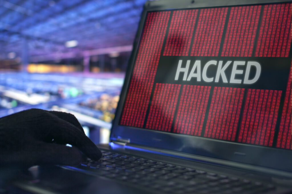 High-Res Cybernetic Wallpaper: 'HACKED' on Matrix Background