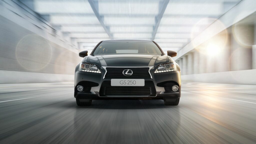 Sleek Lexus GS 250 Wallpaper: High-Res EU Model on Blurred Road