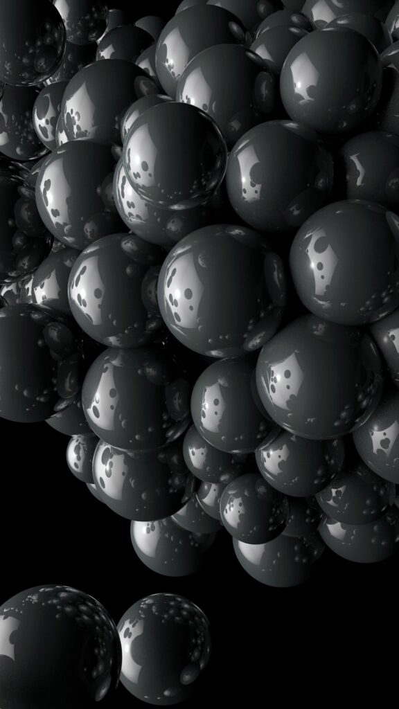 High-Res Wallpaper: Glossy Gray Spheres Cluster on Dark Background