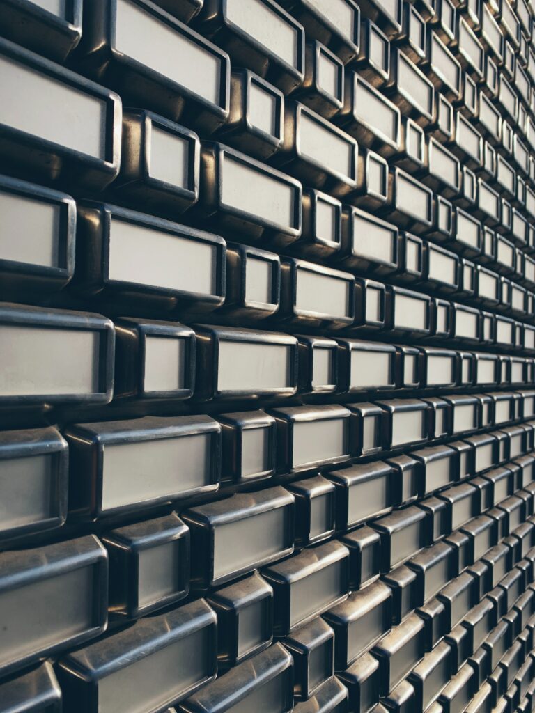 High-Res 3D Relief Wallpaper with Metallic Block Patterns