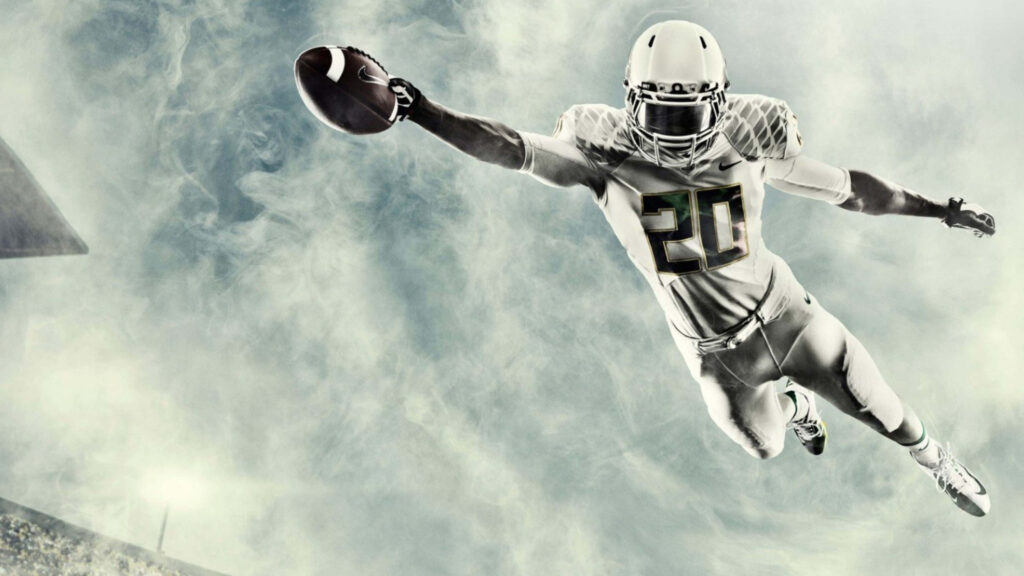 4K Sports Wallpaper: Airborne Football Catch in Dynamic Background