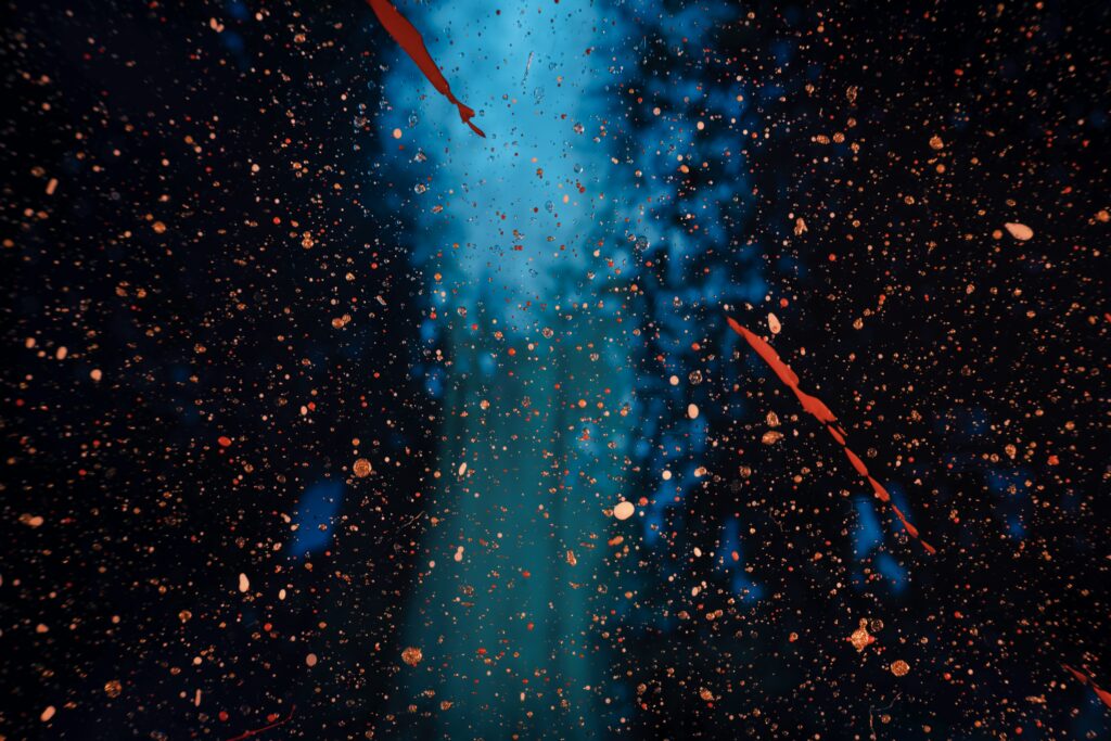 Vivid Abstract Wallpaper: Dynamic Splashes on Dark Background