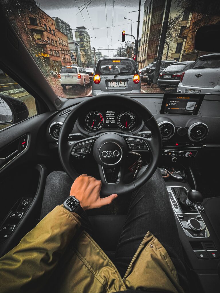 Stylish Audi Interior: High-Res Wallpaper of Steering Wheel & City View