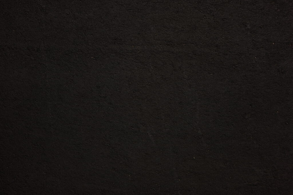 High-Resolution Black Textured Wallpaper: Minimalist Chic Background