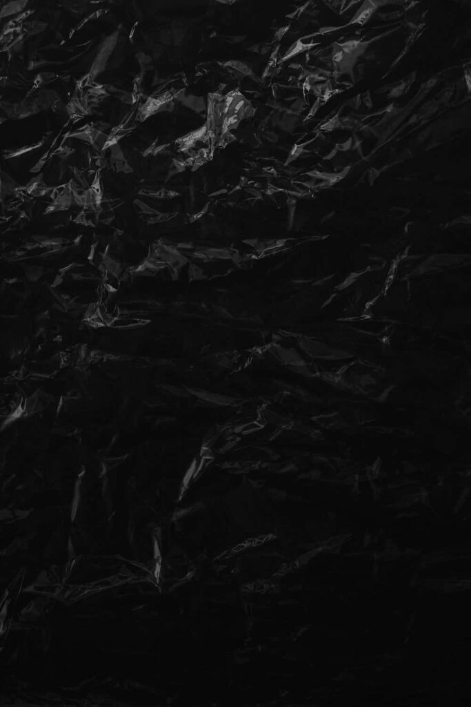 High-Res Crumpled Black Plastic Wallpaper - Edgy Abstract Background