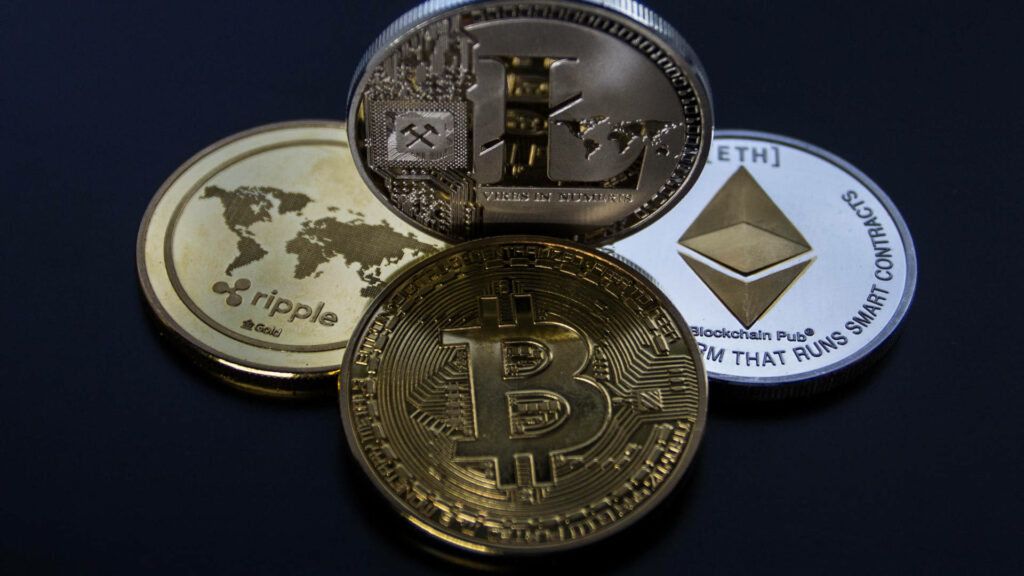 High-resolution wallpaper showing Ethereum Bitcoin Litecoin Ripple coins on dark background