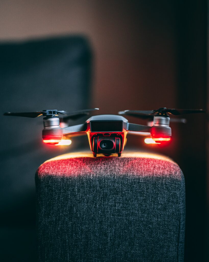 Sleek Drone Wallpaper: High-Res Camera & Red Lights - Tech Innovation