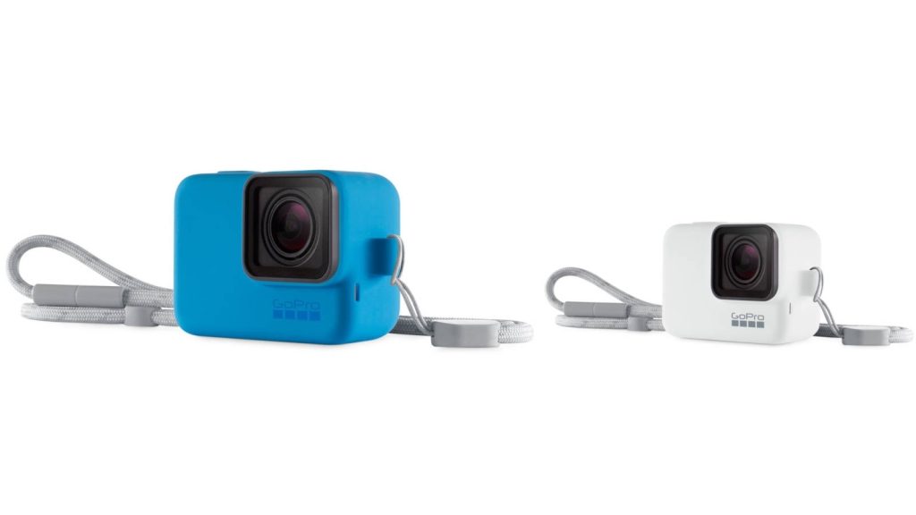 Two GoPro action cameras in blue and white silicone sleeves with lanyards on white background Wallpaper